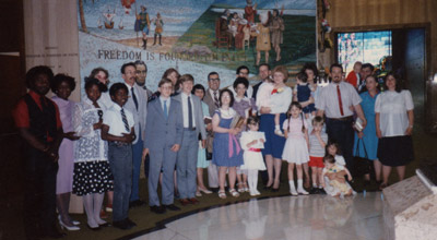 Group of church members smiling for a photo Group of church members smiling for a photo