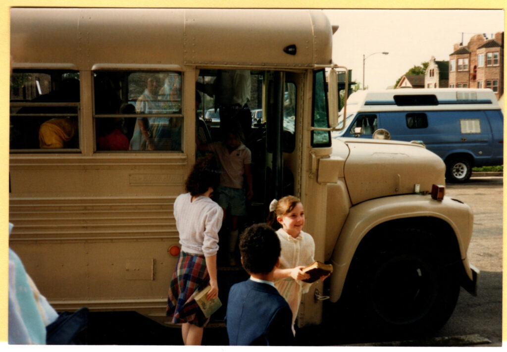 Children arriving for church by bus